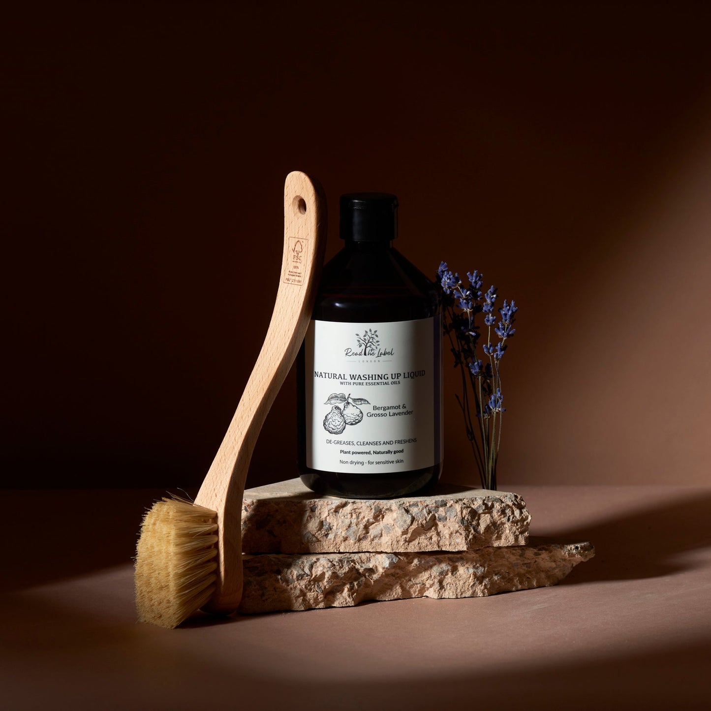 Natural washing up liquid with eucalyptus and geranium by Read The Label London, showing a bottle with fresh herbs and botanical ingredients.