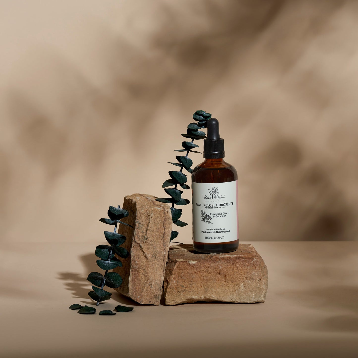 Natural Watercloset Droplets with eucalyptus and geranium scent by Read The Label London, displayed in a clear glass bottle.