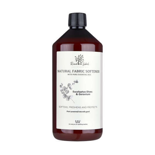 Natural fabric softener from Read The Label London with eucalyptus, dives, and geranium scent, featuring a clear bottle and soft fabric.