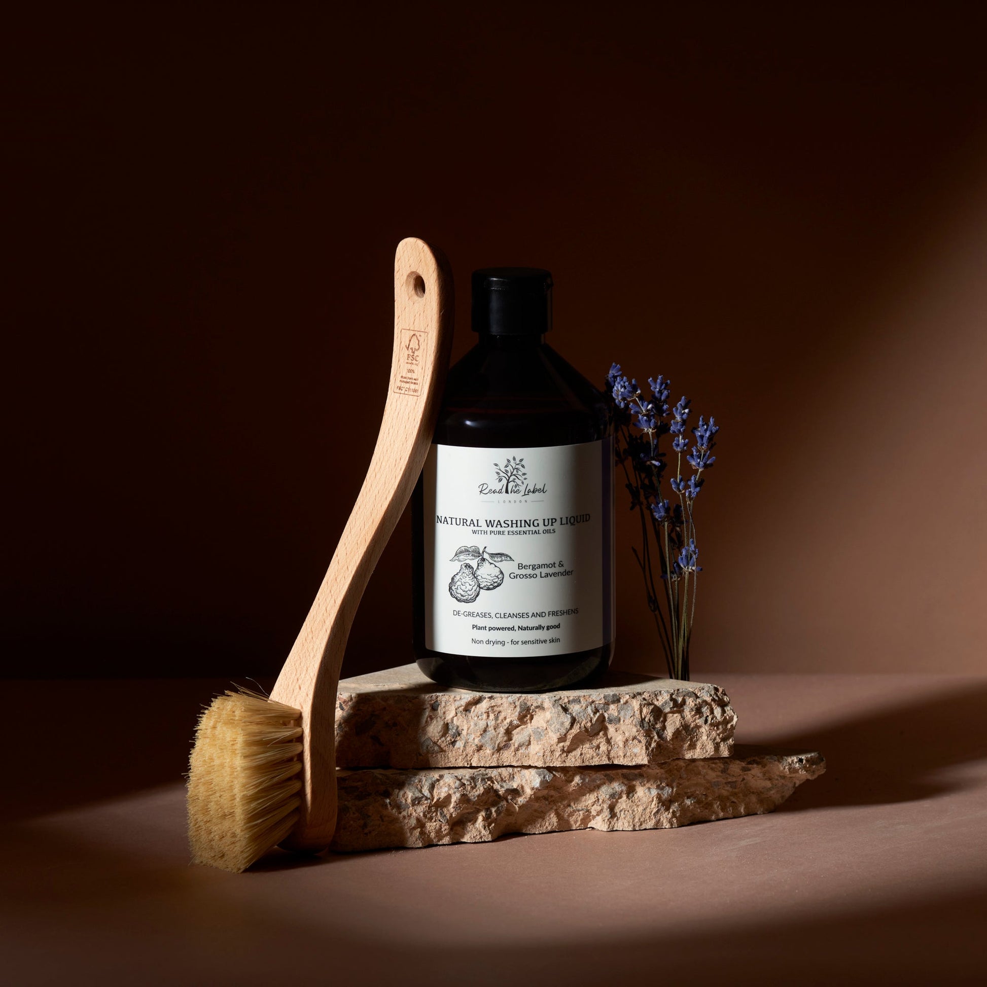 Natural washing up liquid with eucalyptus and geranium by Read The Label London, showing a bottle with fresh herbs and botanical ingredients.