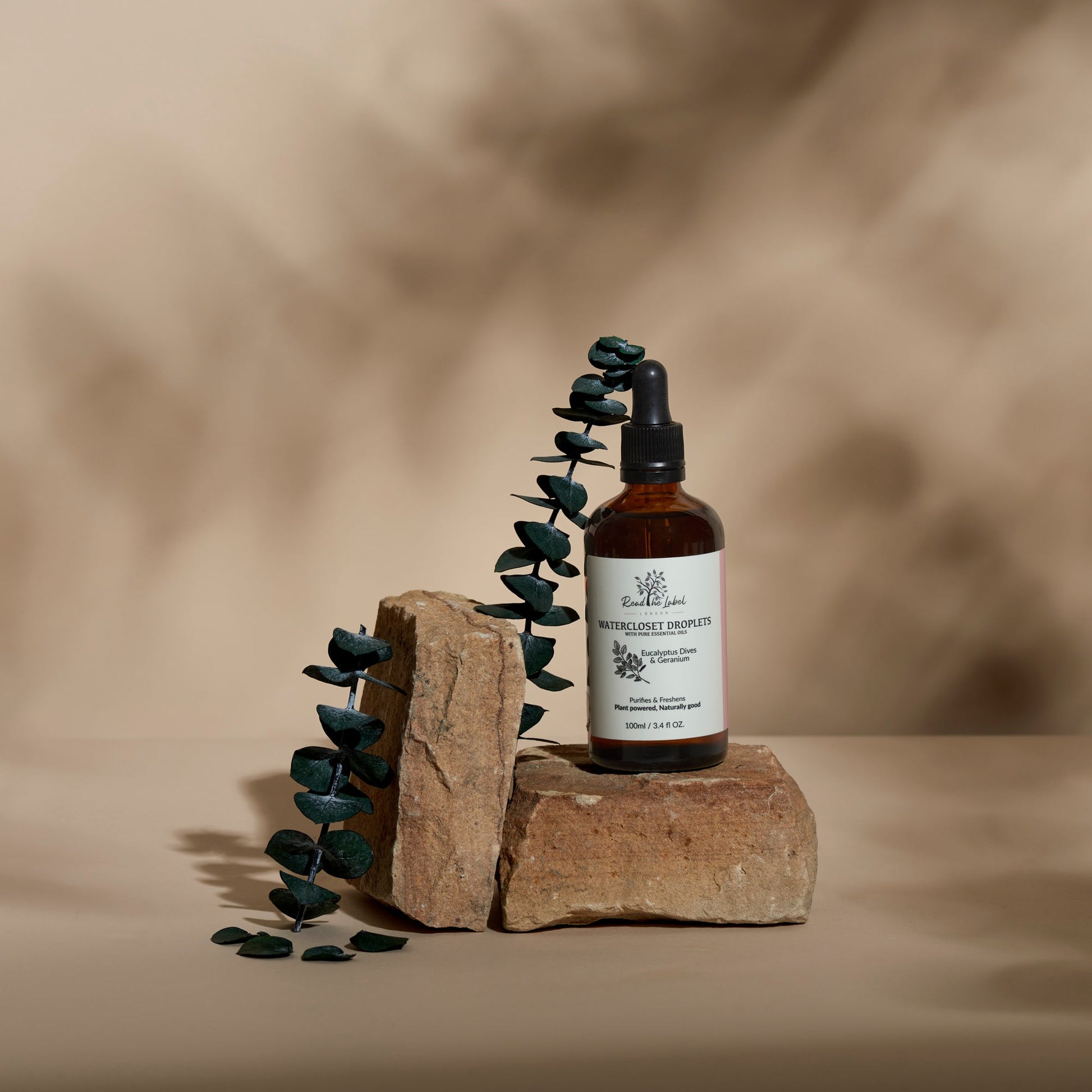 Natural Watercloset Droplets with eucalyptus and geranium scent by Read The Label London, displayed in a clear glass bottle.