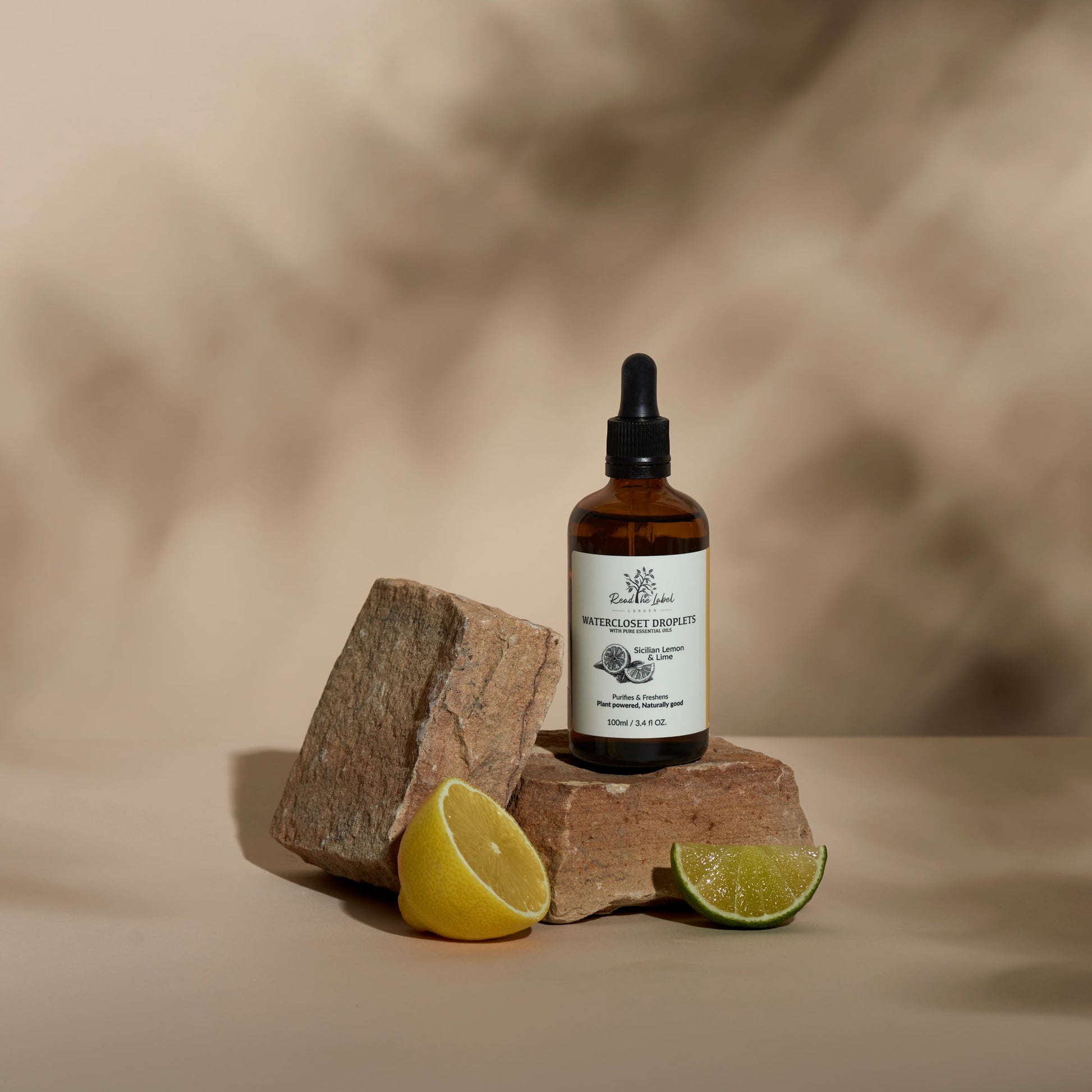 Natural Watercloset Droplets room refresher with Sicilian Lemon and Lime scent, by Read The Label London, featuring a clear glass bottle.